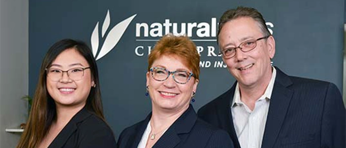 Chiropractor Roseville MN Patricia Wolff With Team