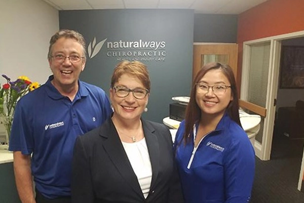 Chiropractor Roseville MN Patricia Wolff With Team Welcome